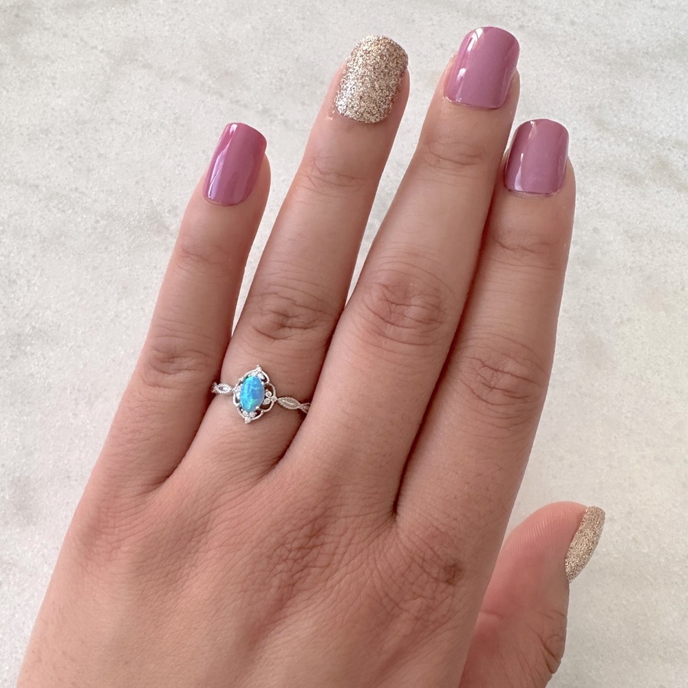 Blue Oval Opal Antique Style Ring set in Yellow Sterling Silver